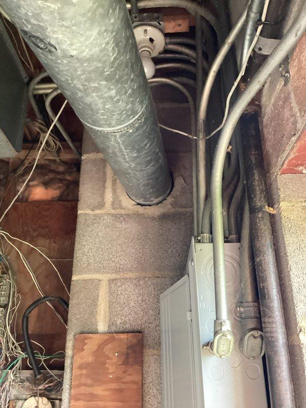 Conducted commercial HVAC assessment for inadequate cooling complaint on aging system. Evaluated return air grille dimensions and inspected mechanical room infrastructure including ductwork, piping, and electrical connections to determine replacement requirements for unit approximately 7-8 years old showing performance degradation.