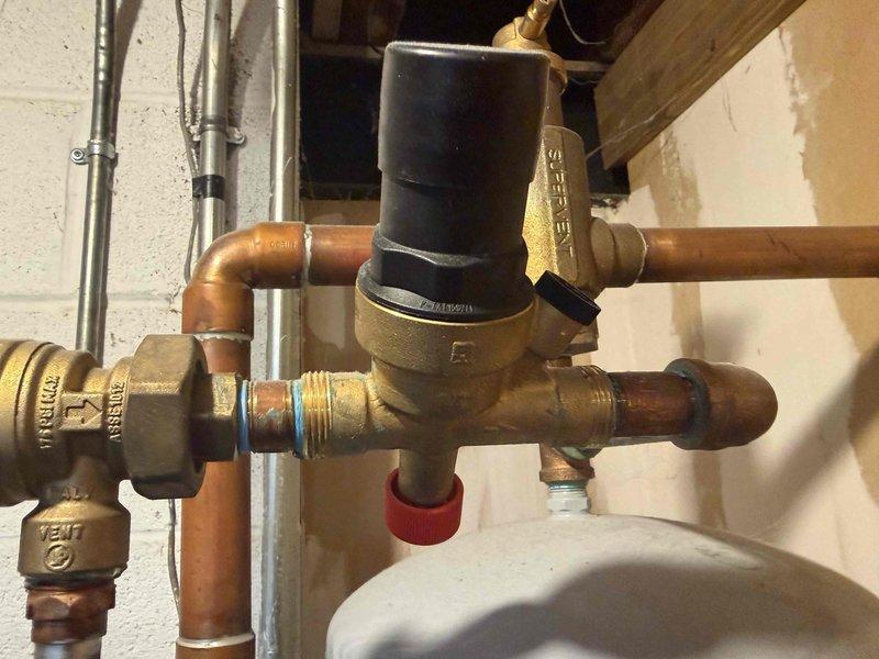 Completed boiler maintenance and combustion analysis as part of club membership visit. Performed gas analysis testing which revealed oxygen levels at 6.49%, carbon monoxide at 48 ppm, and carbon dioxide at 8.08%. Inspected and evaluated pressure reducing valve assembly and associated copper piping connections in mechanical space. All components were assessed for proper operation and safety compliance.