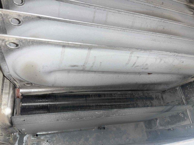 Diagnosed failed evaporator coil with evidence of significant deterioration, mold growth, and moisture damage to surrounding insulation. Ordered replacement evaporator coil and new system batteries, with parts scheduled for return on 9/1 for installation and completion of repair.