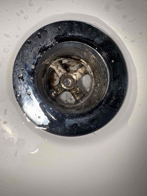 Responded to call for lack of hot water at shower while other fixtures maintained proper hot water supply. Inspected bathroom plumbing fixtures including single-handle shower/tub faucet control and tub spout. Diagnosed issue as faulty shower cartridge preventing hot water flow to shower head while allowing proper function at tub spout and other household fixtures. Replaced defective cartridge in shower valve assembly, restored full hot water function to shower, and verified proper temperature control operation.