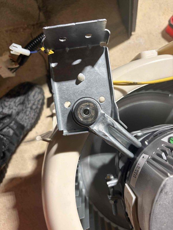 Completed blower motor warranty replacement on HVAC system. Removed failed motor assembly, installed new blower motor unit with mounting bracket, and reconnected all electrical connections and refrigerant lines to restore proper system operation.