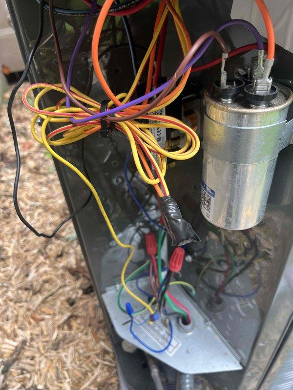 Responded to air conditioning repair call for 2-year-old system. Upon inspection, diagnosed failed dual run capacitor affecting compressor and condenser fan operation. Removed defective capacitor from attic-mounted air handler unit and tested electrical connections to verify proper wiring configuration. Installed new dual run capacitor with correct microfarad ratings, reconnected all electrical leads per manufacturer specifications, and verified proper color-coded wiring connections. Tested system operation to confirm compressor and fan motor startup, verified proper amperage draw, and ensured cooling cycle engaged correctly. System restored to full operational capacity.