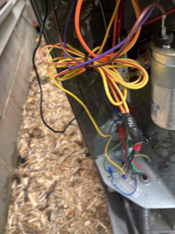 Responded to air conditioning repair call for 2-year-old system. Upon inspection, diagnosed failed dual run capacitor affecting compressor and condenser fan operation. Removed defective capacitor from attic-mounted air handler unit and tested electrical connections to verify proper wiring configuration. Installed new dual run capacitor with correct microfarad ratings, reconnected all electrical leads per manufacturer specifications, and verified proper color-coded wiring connections. Tested system operation to confirm compressor and fan motor startup, verified proper amperage draw, and ensured cooling cycle engaged correctly. System restored to full operational capacity.