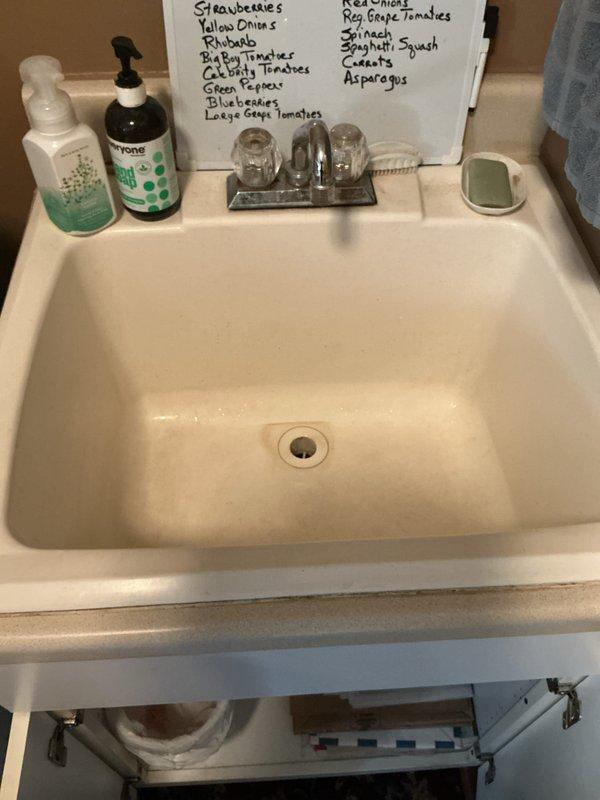 Completed plumbing maintenance club visit inspection of residential bathroom and kitchen facilities. Inspected toilet flush mechanism with tank lid removed, verified proper operation of internal components including float assembly and flush valve, and examined sink plumbing fixtures and drainage systems to ensure proper functionality as part of ongoing membership maintenance program.
