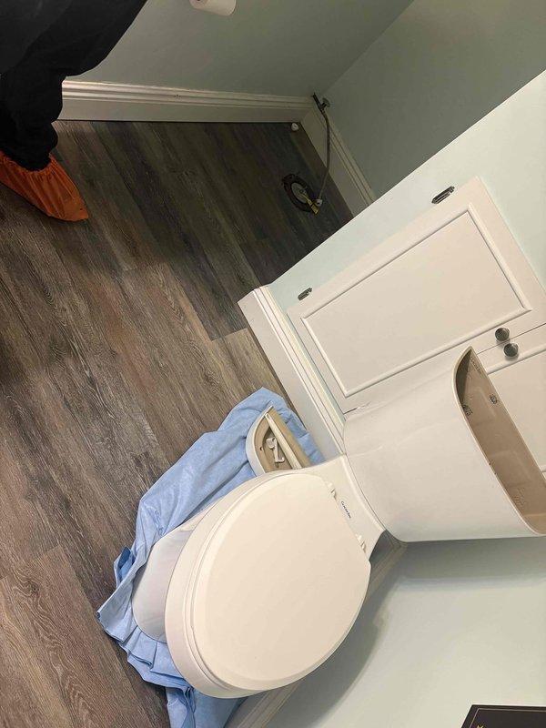 Responded to a bottom floor toilet overflowing when other toilets in the residence were flushed, indicating a main drain line obstruction. Performed video camera inspection of the drainage system to identify the blockage location and severity, revealing debris accumulation within the pipe. Successfully cleared the clog, restoring proper drainage function to all affected fixtures.