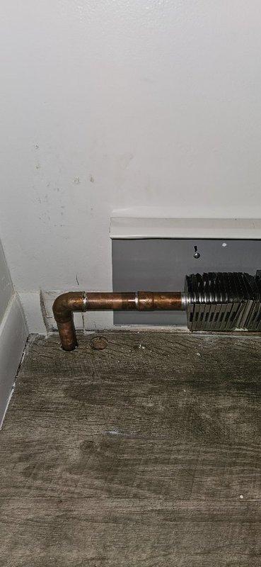 Installed a Peerless MI-x-04 105,000 BTU 84% efficient boiler with complete three-zone heating system. Ran and fished wiring for three new thermostats and zone valves throughout the property, then installed new baseboard heating units in existing rooms. All copper piping connections were completed, zone valves were configured for proper operation, and the system was tested to ensure efficient multi-zone temperature control.