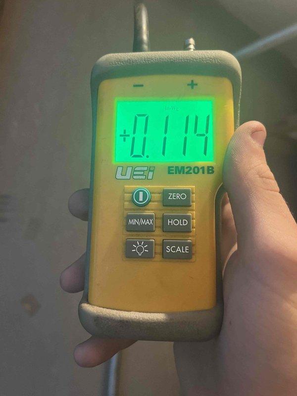 Completed heating maintenance club visit on air handler system. Performed pressure diagnostics using digital manometer, recording static pressure readings of +0.114 and -0.178 inches water column to verify proper airflow and system performance. Equipment operating within normal parameters.