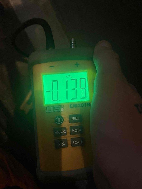 Completed heating maintenance club visit on air handler system. Performed pressure diagnostics using digital manometer, recording static pressure readings of +0.114 and -0.178 inches water column to verify proper airflow and system performance. Equipment operating within normal parameters.