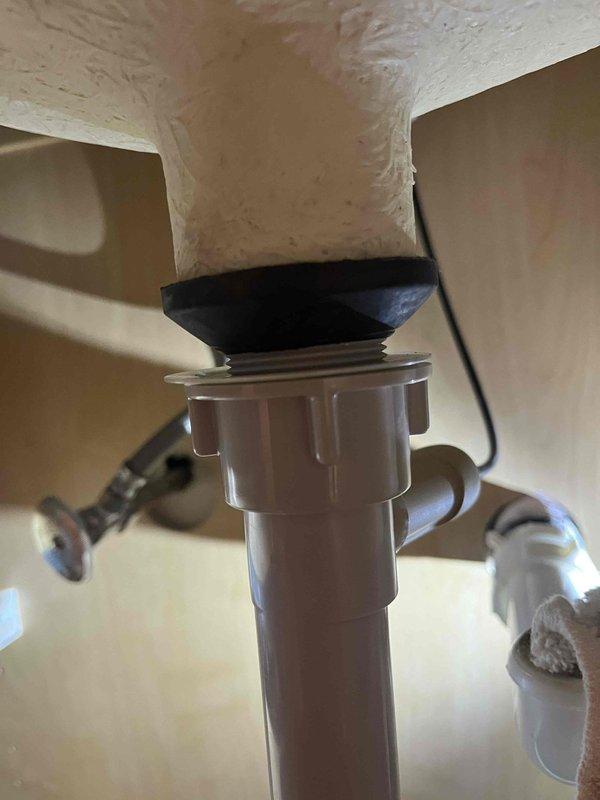 Installed two customer-supplied bathroom faucets with complete connection to existing water supply lines and drain assemblies. All fixtures were properly secured, tested for leaks, and verified for proper operation with chrome flexible supply lines connected to angle stop valves and P-trap drain configuration confirmed functional.