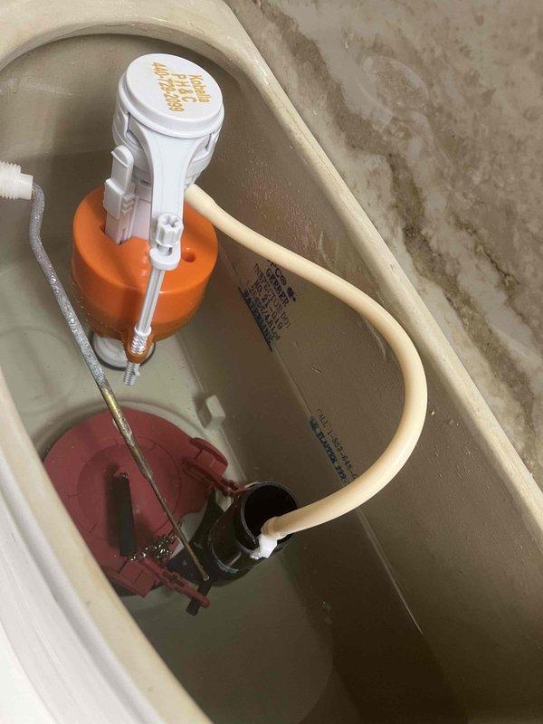 Responded to service call for high water bill with audible water running but no visible leak. Upon inspection, identified faulty toilet flapper valve causing continuous water flow into bowl. Replaced worn flapper assembly and tested flush mechanism to ensure proper seal and operation, resolving the hidden leak issue.