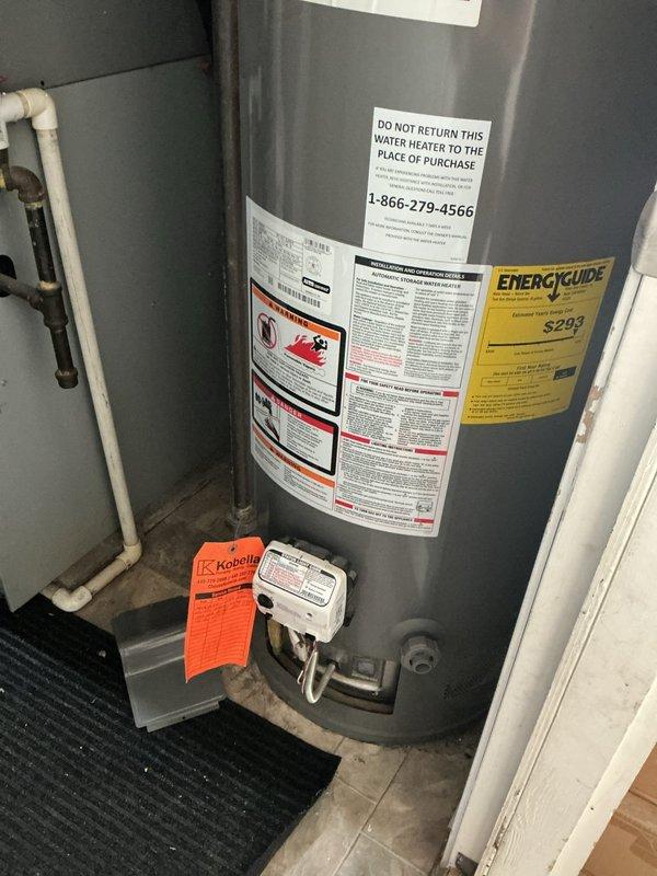 Responded to no hot water complaint on Rheem tanked water heater. Upon arrival, confirmed pilot light was extinguished and could not be relit. Inspected gas control valve assembly and observed clouded pilot sight glass, indicating potential thermocouple failure or gas valve malfunction. Evaluated existing installation including proper venting through galvanized ductwork, copper supply lines, and expansion tank. Diagnosed failed gas control valve assembly preventing pilot ignition and normal water heater operation.
