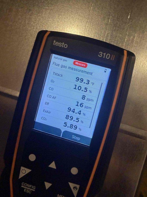Completed heating maintenance tune-up on air handler unit for club member. Inspected and documented air filter condition, which showed moderate dust accumulation and discoloration from use. Performed flue gas analysis using combustion analyzer, recording oxygen levels, carbon monoxide readings, efficiency percentages, and CO2 measurements to verify proper system operation and combustion safety.
