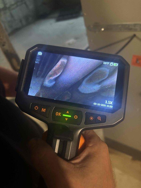 Responded to no-heat call on furnace installed in 2023. Performed diagnostic inspection using borescope camera to examine internal components and heat exchanger. Identified failed ignitor assembly and replaced component to restore proper furnace operation.