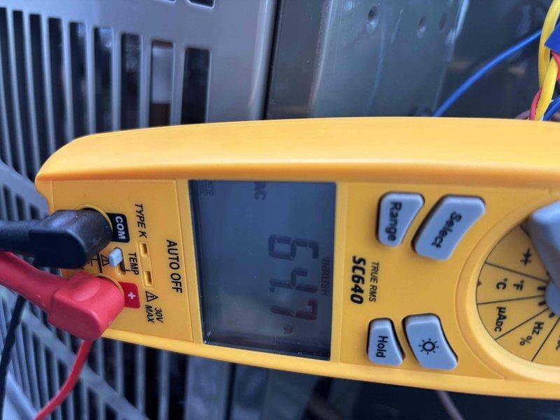 Completed cooling maintenance club visit for air handler experiencing rattling noise. Performed diagnostic testing with digital multimeter, obtaining readings on electrical components. Inspected and documented HVAC filter condition, which appeared clean with proper pleating intact and filter housing secure.