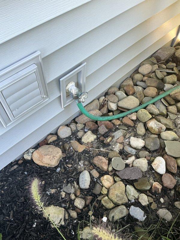 Completed plumbing membership visit and comprehensive system inspection. Evaluated traditional tank-style water heater in utility room, noting all connections, expansion tank, and associated copper piping in satisfactory condition. Identified outdoor water spigot requiring replacement due to wear and addressed critical inquiry regarding tankless water heater conversion feasibility for future consideration.