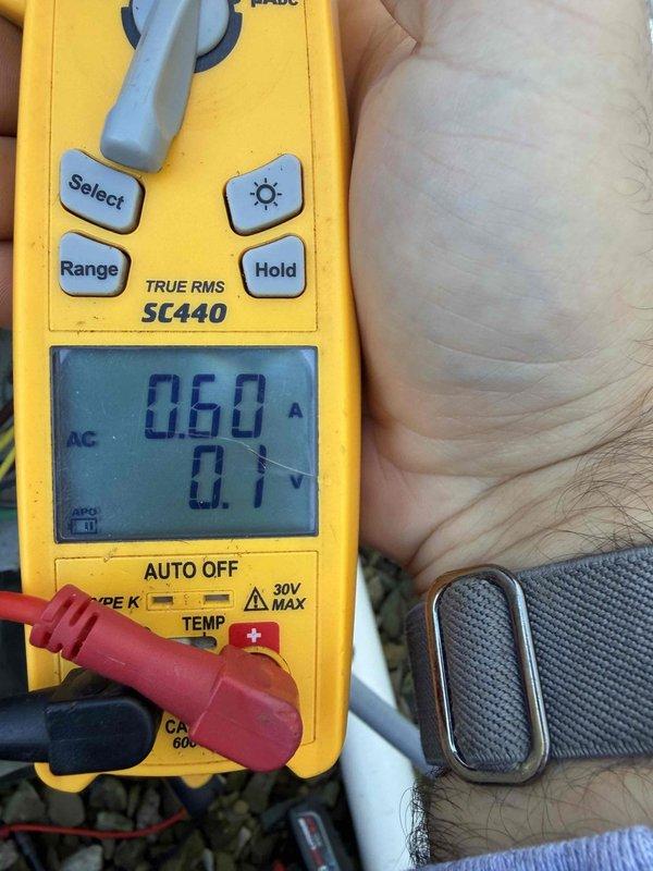 Completed comprehensive cooling and heating maintenance on air handler unit as part of club membership service. Performed standard seasonal tune-up procedures including inspection of dual-run capacitor (45/5 μF, 440VAC rated), verified proper electrical specifications and terminal connections. Utilized digital multimeter to measure and confirm system amperage draw at 0.60A and voltage readings, ensuring all electrical parameters are within manufacturer specifications. All components tested and found operating normally with no deficiencies noted at time of service.