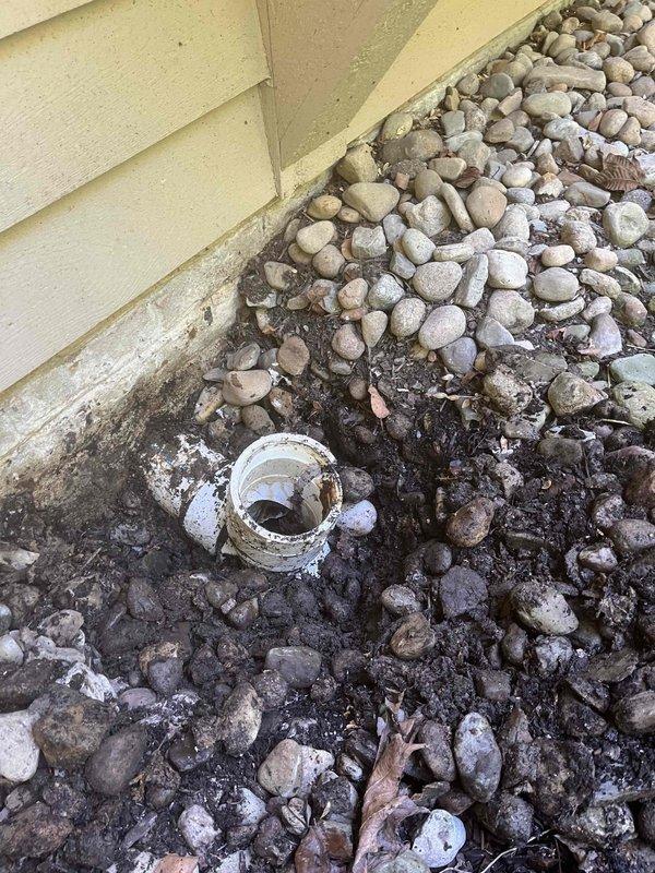 Completed sewer line replacement through basement wall to address moisture infiltration and deteriorated plumbing connections. Removed heavily corroded cast iron piping and fittings that showed extensive rust damage, mineral deposits, and compromised structural integrity throughout the basement penetration point. Installed new PVC sewer line with proper pitch and sealed penetration through foundation wall to prevent future water intrusion. Additionally installed two new gas line runs as requested to meet current code requirements and ensure safe fuel delivery to appliances.