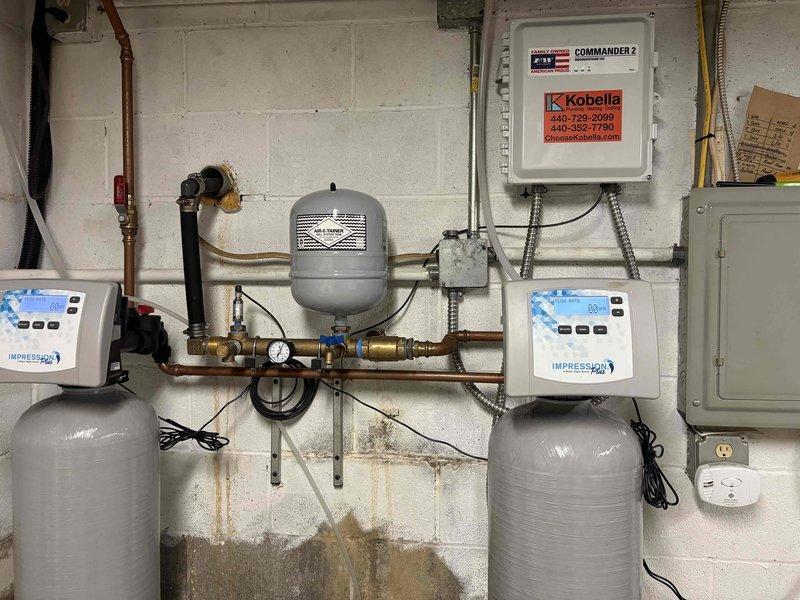 Returned to property to address well line running from home to well system. Upon inspection, identified compromised section of underground piping with visible soil intrusion and cavity formation around the line. Excavated affected area to expose damaged pipe section and assess extent of deterioration. 

Replaced compromised piping segment with new copper line, ensuring proper grade and support. Installed pressure regulation components and verified system integrity. Confirmed proper operation of dual well pump control system with Impression controllers and Commander 2 electrical panel. Tested pressure tank, gauge readings, and all valves for proper function. Backfilled excavation and restored work area. System operating within normal parameters with no leaks detected.