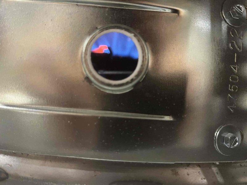 Serviced existing water treatment system consisting of multiple filtration tanks and control valves. Replaced depleted chlorine tablets in chlorination unit to address returning odor issues in water supply. System inspected and confirmed operational after tablet replacement.