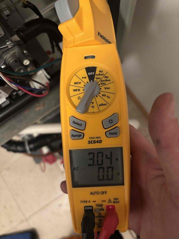 Completed comprehensive AC tune-up and maintenance inspection on 9-year-old cooling system. Performed electrical diagnostics using clamp meter to verify proper amperage draw and system performance, checked refrigerant levels, inspected condensate drain assembly and P-trap for proper operation, and confirmed all mechanical components functioning within normal parameters.