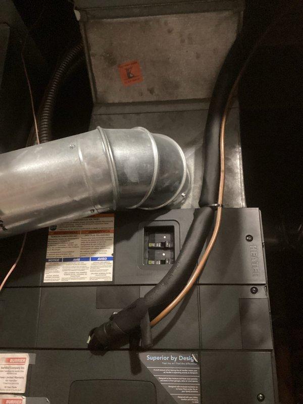 Completed full heat pump and air handler replacement system due to chronic operational failures of existing equipment. Previous unit experienced recurring shutdowns every 20 minutes, persistent low refrigerant warnings, and extensive service history indicating system failure. Removed failed outdoor heat pump unit and indoor air handler. Installed new air handler in mechanical room with properly sized metallic supply ductwork and insulated refrigerant line set. Verified electrical connections at panel box, confirmed proper circuit protection, and tested system operation. New installation includes manufacturer-labeled equipment with appropriate safety documentation and operational specifications.