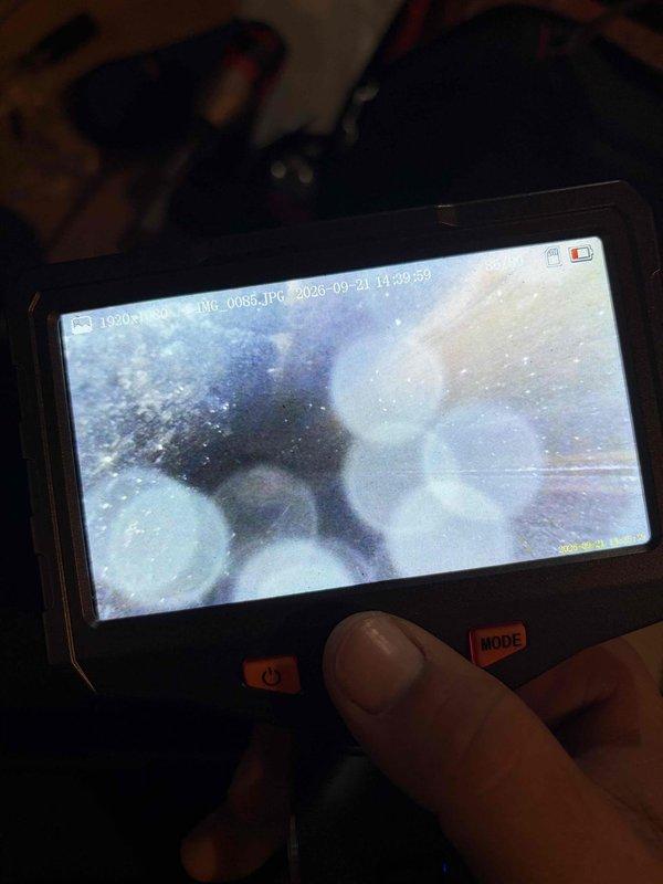 Completed seasonal maintenance tune-up on 3-year-old furnace operating without issues. Performed standard inspection protocol including visual examination of heat exchanger and flue pipe using borescope camera, which revealed normal operational residue and moisture patterns consistent with proper combustion and venting. All system components checked and found functioning within normal parameters.