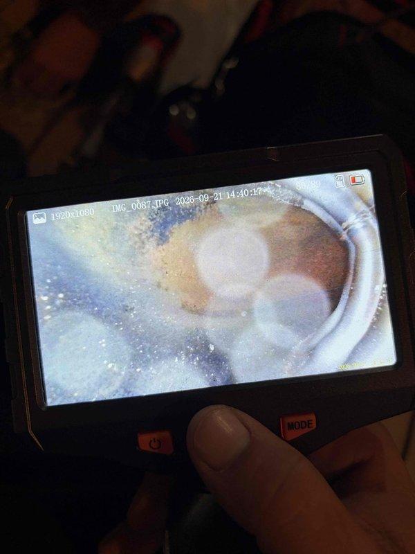 Completed seasonal maintenance tune-up on 3-year-old furnace operating without issues. Performed standard inspection protocol including visual examination of heat exchanger and flue pipe using borescope camera, which revealed normal operational residue and moisture patterns consistent with proper combustion and venting. All system components checked and found functioning within normal parameters.