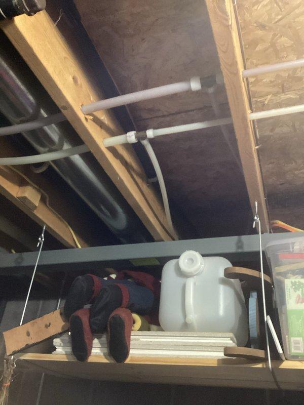 Responded to water leak issue from 20-year-old furnace system. Conducted thorough inspection of HVAC equipment and documented existing thermostat configuration and mechanical room conditions via photos. Provided comprehensive replacement estimate for aging furnace unit to address water discharge concern and prevent further damage to flooring area.