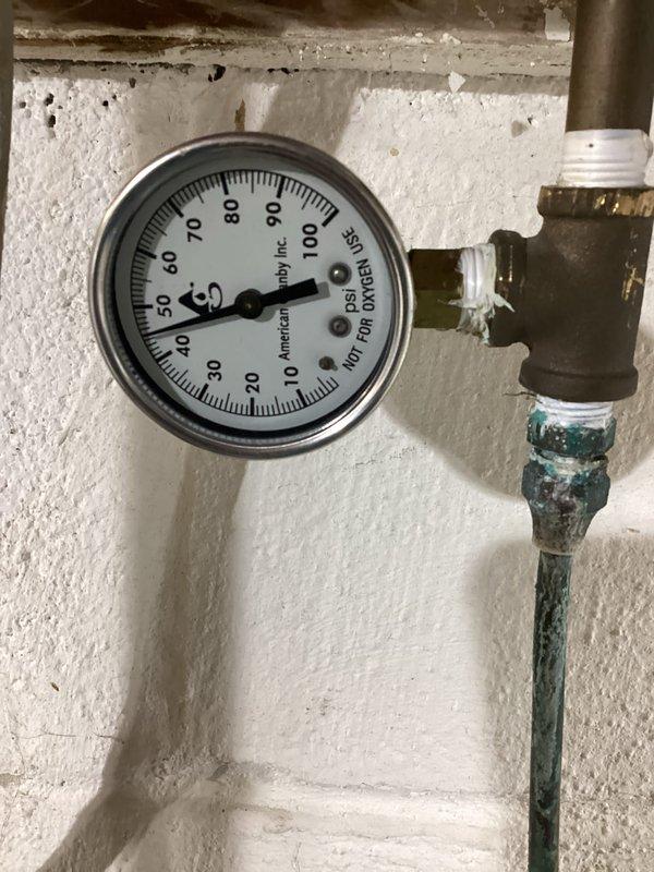 Completed tanked water heater flush service and performed system inspection. Upon evaluation, identified water odor issue likely caused by deteriorated anode rod requiring replacement. Documented system pressure readings and observed corrosion on plumbing connections. Verified water quality at kitchen fixtures following flush procedure.