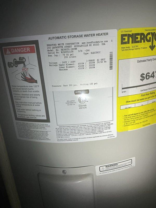 Arrived on site and shut off power to the water heater at the electrical panel as required for the tanked water heater flush service. Verified power disconnection using a digital multimeter, confirming zero voltage at the heating element terminals before proceeding with maintenance. Inspected the Bradford White automatic storage water heater, noting specifications of 240V/208V operation with 4500W heating elements and 150 PSI working pressure rating. Completed the water heater flush procedure to remove sediment buildup from the tank bottom, ensuring optimal heating efficiency and extending equipment lifespan. Restored electrical power and confirmed proper operation upon completion.
