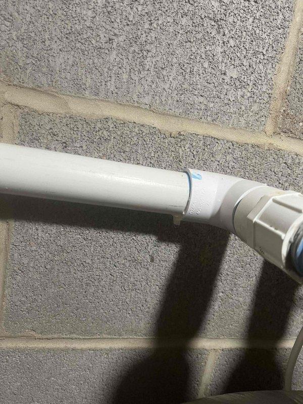 Responded to service call for non-proprietary water treatment system experiencing a cracked chlorinated water line and loud vibrating noise during regeneration cycles. Inspected the PVC distribution piping and multi-tank water conditioning setup, documented the damaged pipe section and mechanical connections for repair recommendations.