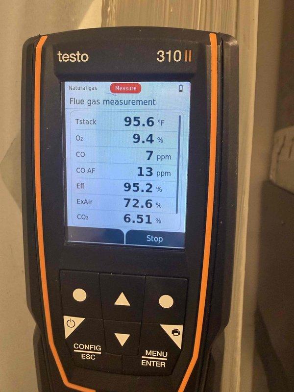 Completed heating maintenance club visit on natural gas furnace system. Performed comprehensive combustion analysis using Testo 310 II flue gas analyzer, confirming optimal system performance with readings showing 95.2% efficiency, oxygen level at 9.4%, carbon monoxide at 7 ppm in flue gas and 13 ppm air-free, CO2 at 6.51%, stack temperature at 95.6°F, and excess air at 72.6%. Inspected and cleaned flame sensor electrode, which was found to be in good working condition with clean ceramic insulator and proper electrical connectivity. All safety controls and combustion parameters verified within manufacturer specifications. System operating efficiently and safely.
