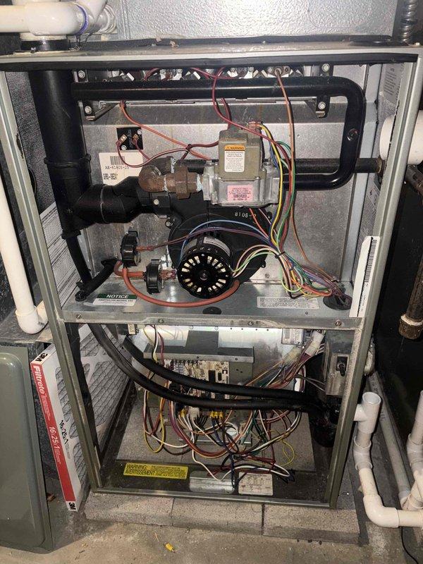 Responded to gas service shutoff for suspected leak in residential system. Performed comprehensive gas line pressure test and visual inspection of all accessible gas piping and connections throughout the property. Inspected furnace gas valve assembly, burner compartment, and heat exchanger for potential leak points. All gas connections, joints, and fittings tested and confirmed leak-free. System cleared for safe operation and gas service restoration.