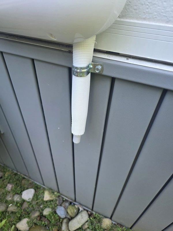 Completed mini split installation with exterior line set and electrical disconnect properly mounted and secured to building exterior. Customer received full system and paid in full at time of installation. Noted existing electronic air cleaner on forced air system is non-functional; customer expressed interest in replacement or upgrade options for future service.