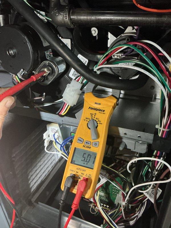 Completed heating maintenance club visit on residential HVAC system. Performed comprehensive diagnostic testing of electrical components using digital multimeter, verifying proper voltage readings at control board and throughout system wiring. Inspected blower assembly including motor, wheel, and shaft connections. All electrical connections tested within normal operating parameters. Blower wheel and motor housing showed typical dust accumulation from normal operation but components remain functional with no mechanical concerns noted at this time.