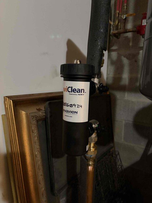 Completed boiler system upgrade including installation of new expansion tank, magnetic filtration system, and air vents. The expansion tank was properly mounted and integrated into the existing copper piping configuration to maintain correct system pressurization. A wiClean magnetic filter was installed in-line to remove ferrous debris and protect the boiler from sediment buildup, extending equipment life and maintaining efficiency. New automatic air vents were added at appropriate locations throughout the system to eliminate trapped air and ensure proper circulation. All connections were made with copper piping and brass fittings, pressure tested, and verified for proper operation.