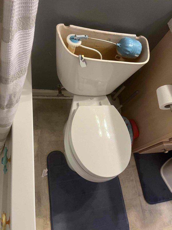 Responded to service call for toilet flush valve replacement assistance. Upon arrival, found customer had attempted to replace the flush valve but encountered difficulties completing the installation. Removed tank lid and assessed the internal tank components. Successfully completed the flush valve replacement, ensuring proper alignment and secure connections of the new blue flush valve assembly. Adjusted float mechanism and water level settings. Tested flush operation multiple times to verify proper function and confirm no leaks at valve connections or tank base. Reinstalled tank lid and left toilet in full working order.