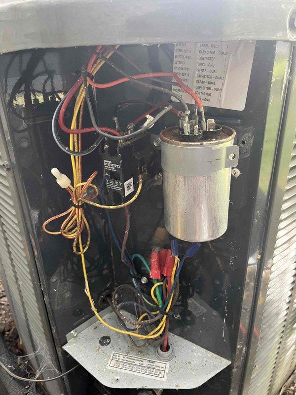 Responded to service call for noise complaint from air handler unit. Upon arrival, performed diagnostic inspection of electrical components and measured system amperage readings using clamp meter, which indicated 92.6 amps. Opened electrical compartment and inspected capacitor, contactor, and associated wiring connections. All electrical components appeared to be in normal operating condition with proper wire connections and no visible signs of failure or excessive wear. System operational at time of inspection.