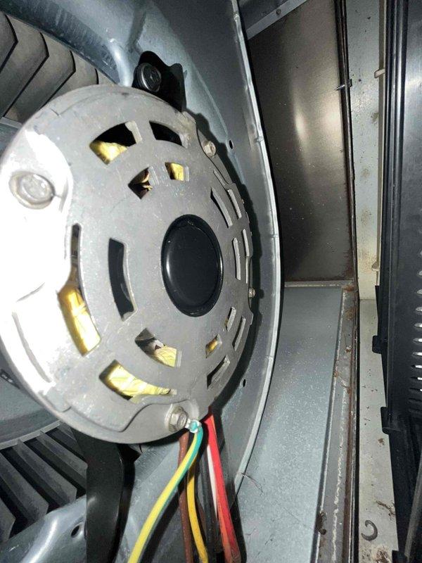 Completed heating maintenance club visit on air handler unit. Performed thorough inspection of blower motor assembly, verified proper electrical connections on all motor leads, and confirmed blower wheel operation. All components found in good working condition with normal operational wear patterns.
