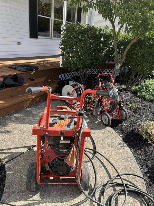 Performed camera inspection of downspout drainage system to assess interior condition and identify potential blockages or structural issues. Deployed specialized drain camera equipment to evaluate the underground drainage lines and determine proper water flow from the gutter system to the discharge point.