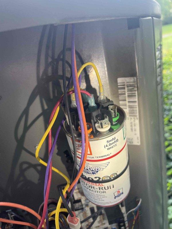 Completed routine HVAC club maintenance visit on air handler system. Performed comprehensive inspection of electrical components, including capacitor examination showing 5mfd rated unit with proper wire connections and terminal designations intact. Verified system voltage reading at 236.9V using digital clamp meter. All electrical connections found secure with no signs of deterioration. Documented equipment condition with photos for service records. Unit operating within normal parameters with no repairs required at this time.