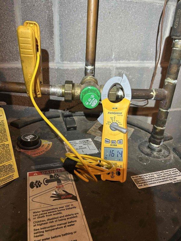 Responded to service call for indirect fired water heater experiencing operational issues. Upon arrival, performed diagnostic testing using clamp meter to measure electrical current and verify system performance. Tested and evaluated the existing plumbing connections, copper piping, and brass fittings associated with the unit. Installed thermal mixing valve as specified to regulate water temperature output and ensure safe delivery temperatures. Verified all connections were secure and system was functioning properly before completing the service call.
