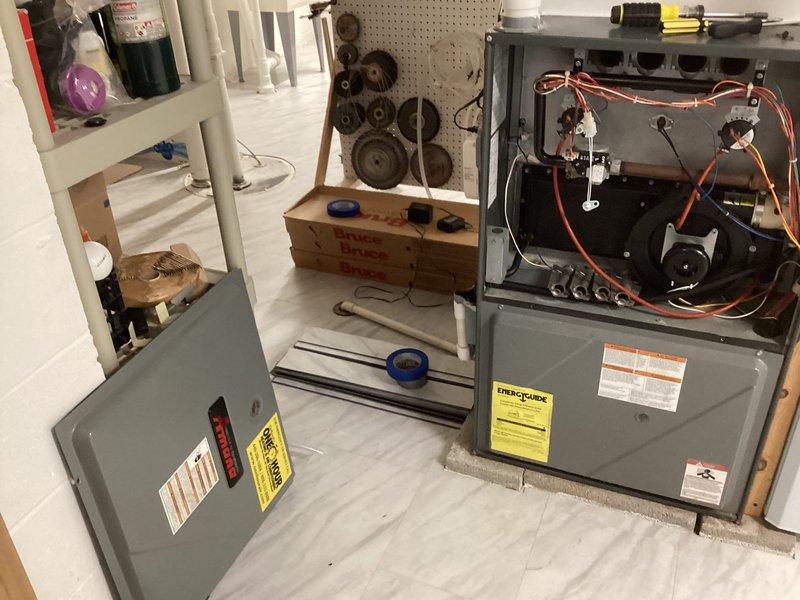 Conducted comprehensive assessment of existing HVAC system for replacement estimate at owner-occupied residence. Evaluated 20-year-old furnace and aging air conditioning system, both approaching end of serviceable life. Inspected furnace internal components including blower assembly, copper refrigerant lines, electrical connections, and control systems. Documented existing equipment specifications, HRV unit, and current system configuration to provide accurate replacement recommendations for complete heating and cooling system upgrade.