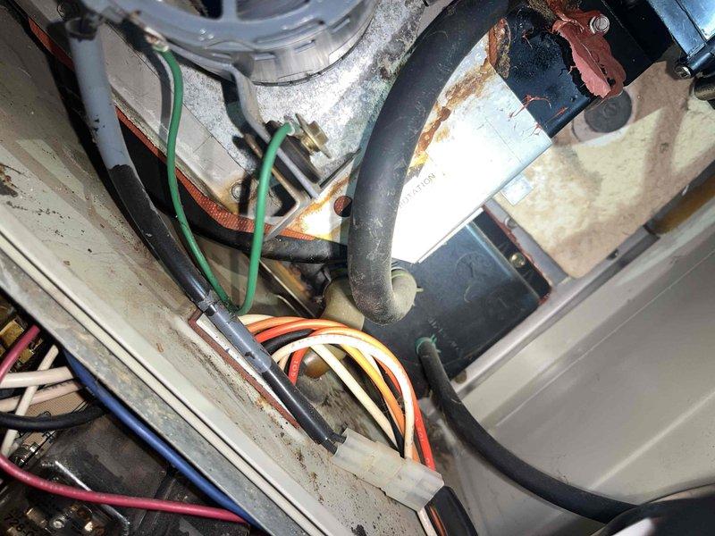 Completed comprehensive furnace tune-up on air handler unit, including inspection of blower motor assembly, electrical connections, and wiring harnesses. All components were examined for proper operation, connections were verified secure, and system was found to be functioning within normal parameters.