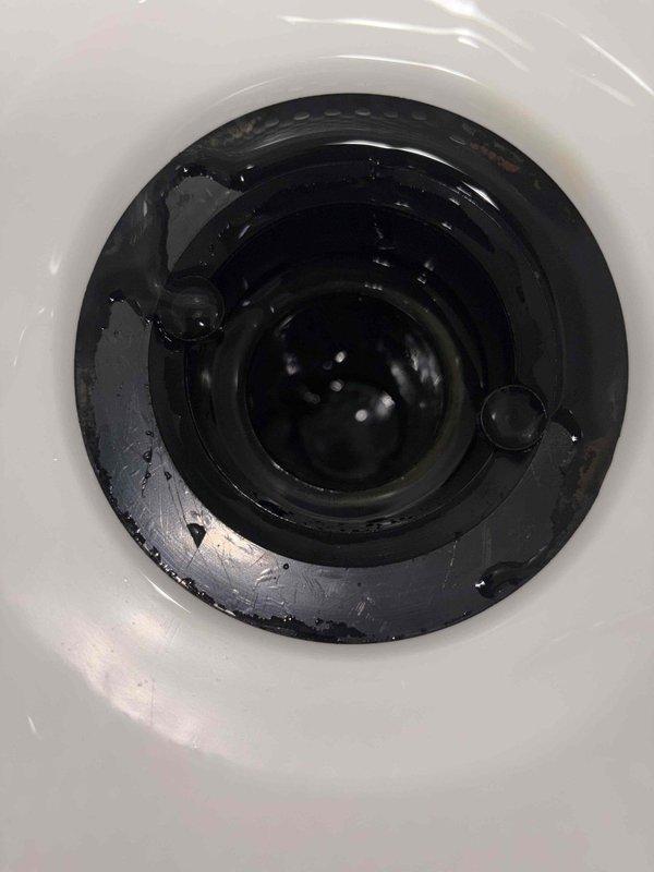 Responded to master bathroom odor complaint. Inspected and serviced shower drain assembly, removing debris and buildup that homeowner was unable to clear. Also inspected and serviced toilet tank fill valve mechanism to ensure proper operation and rule out additional sources of odor.