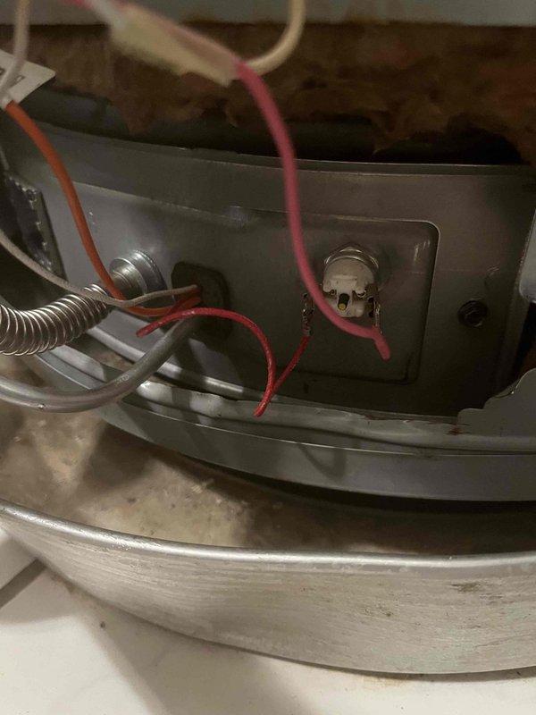 Responded to a no hot water complaint at a residential property with a Lochinvar tanked water heater. Upon arrival, performed diagnostic inspection of the unit and associated components. Inspected the gas control valve, thermocouple, and pilot assembly for proper operation. Examined electrical connections and found several loose or disconnected wires at the control panel that were preventing proper ignition sequence. Reconnected and secured all electrical wiring to manufacturer specifications.

Tested gas supply pressure and verified adequate flow to the burner assembly. Inspected the flue venting system, including both rigid and flexible ductwork sections, to ensure proper draft and exhaust of combustion gases. Checked copper water supply lines and connections for leaks or restrictions. Verified the temperature and pressure relief valve was functioning correctly and properly installed.

Relit the pilot light and cycled the burner through multiple heating cycles to confirm proper ignit