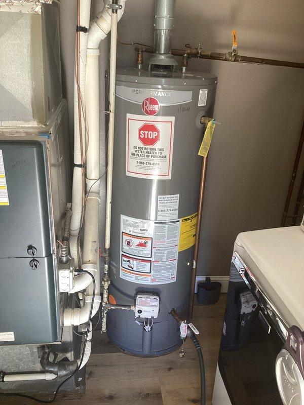 Completed routine plumbing maintenance membership visit and inspected standard 50-gallon Rheem Performance water heater. Verified proper operation of unit, examined all safety labels and warning indicators, checked gas shut-off valve functionality, inspected copper supply lines and venting system, and documented equipment condition with photographs for service records.