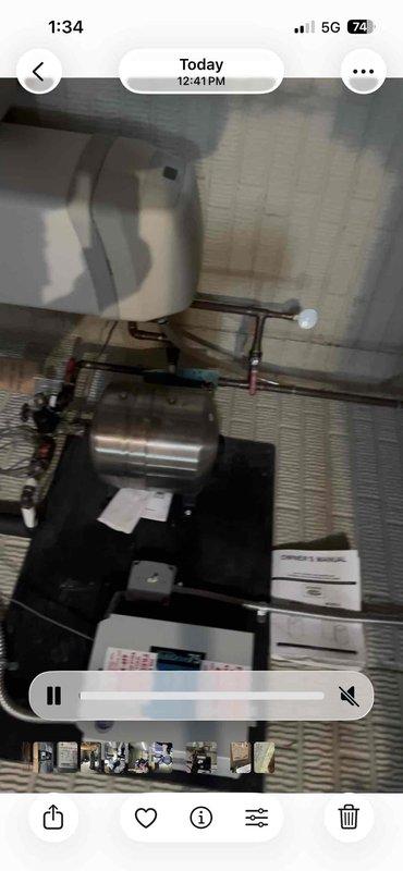 Completed plumbing membership visit and inspection of residential water heating system. Documented State ProLine commercial-grade tank-type water heater installation in utility room, confirming proper expansion tank connection and copper supply line configuration. Verified system operational status and captured equipment specifications for maintenance records.