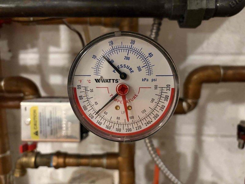 Responded to service call for boiler displaying E430 error code with no heat condition. Upon arrival, performed diagnostic evaluation and reviewed previous repair history from March involving similar error code. Inspected system pressure and temperature readings via Watts gauge, verified water pressure regulator settings at 20 PSI, and examined all copper piping connections for integrity. Tested boiler operation, checked all safety controls, and evaluated pressure relief valve function. Determined root cause of recurring E430 error, discussed findings with customer regarding previous repair and current warranty coverage status, and provided recommendations for resolution to prevent future occurrences.