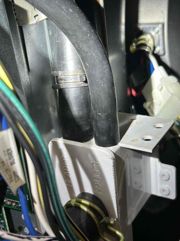 Responded to no heat call on Ruud furnace system. Upon arrival, inspected unit and verified all mechanical components, condensate drainage system, and electrical connections were functioning properly. Customer concern appeared related to thermostat app connectivity rather than actual heating malfunction. Documented existing installation conditions including condensate trap assembly and internal wiring harness. System operational at time of inspection with no heating deficiencies found.